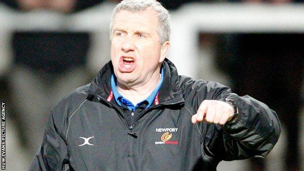 Lyn Jones looking angry as he shouts instructions to the Dragons players