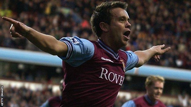 Lee Hendrie celebrates a goal for Aston Villa
