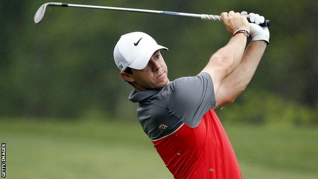 McIlroy watches his shot on the sixth hole in Houston