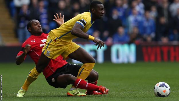 Cardiff City defender Kevin Theophile-Catherine battles for the ball with Crystal Palace's Yannick Bolasie during Saturday’s Premier League game at Cardiff City Stadium.