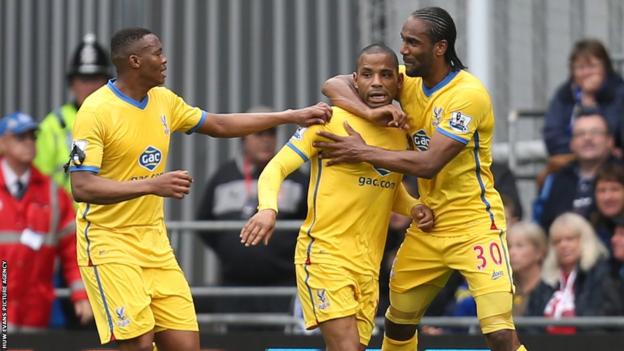 Jason Puncheon is congratulated by former Cardiff City striker Cameron Jerome (right) after giving Crystal Palace the lead at Cardiff City Stadium.