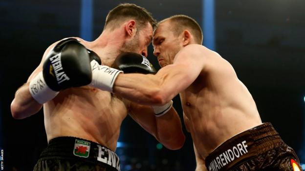 Enzo Maccarinelli and Jurgen Brahmer clash heads in the first round of their WBA light-heavyweight title fight in Rostock, Germany