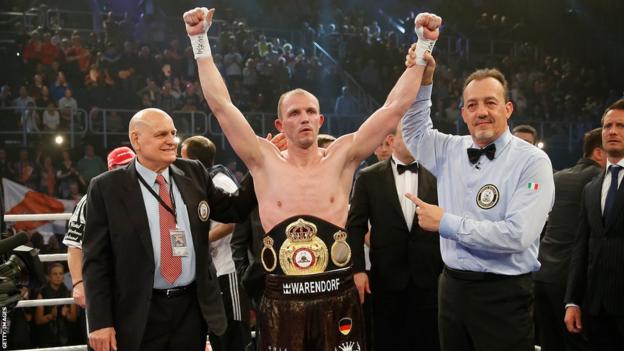 Jurgen Brahmer is confirmed as the winner after Enzo Maccarinelli's corner pulls him out at the end of the fifth round