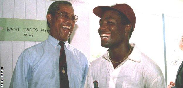 Brian Lara is greeted by former world record holder Sir Garfield Sobers