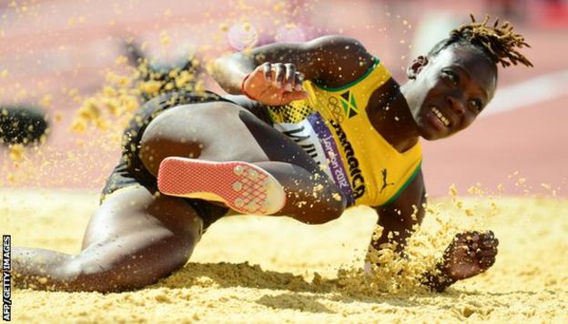 Jamaica's Kimberly Williams competes in the women's triple jump qualifying rounds at the athletics event during the London 2012 Olympic Games on August 3, 2012 in London.