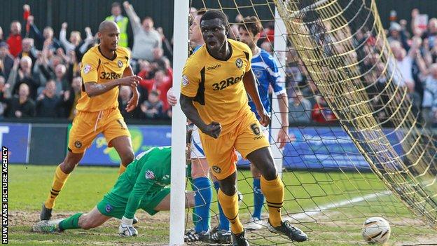 Ismail Yakubu celebrates scoring for Newport County