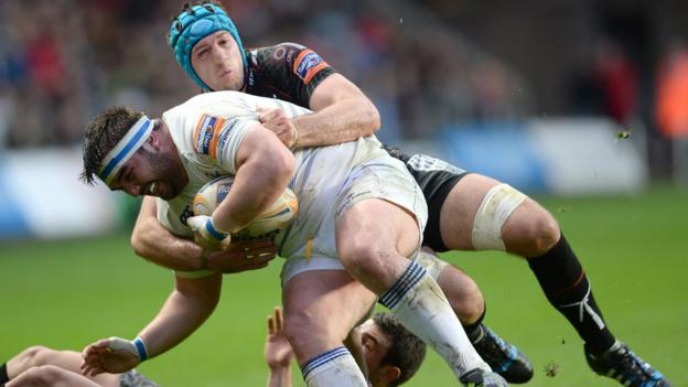 Justin Tipuric and Tom Habberfield tackle Martin Moore