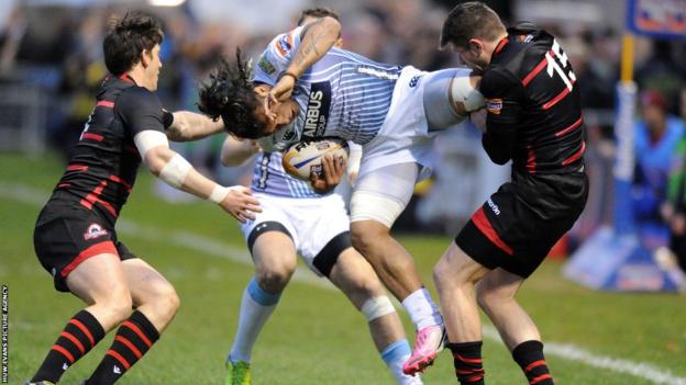 Cardiff Blues centre Isaia Tuifua is tackled by Edinburgh full-back Jack Cuthbert in the Pro12 at Meggatland