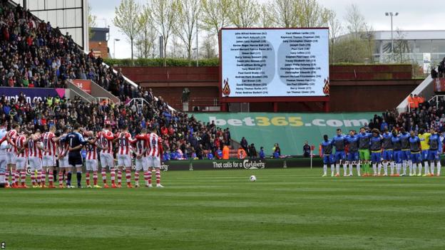Names of the 96 Liverpool fans on the big screen before Stoke City v Newcastle United