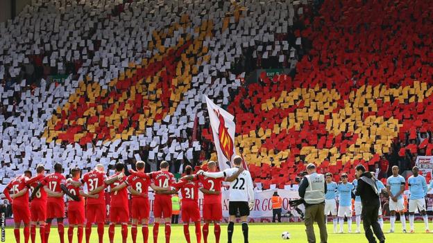 Liverpool and Manchester City players mark a minute's silence in memory of Hillsborough