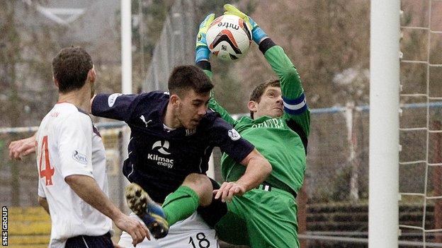 Falkirk keeper Michael McGovern in action against Dundee