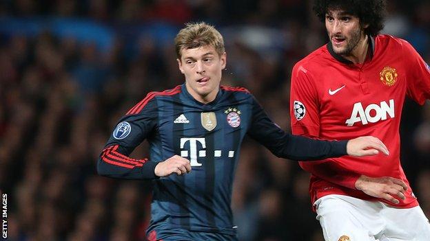 Toni Kroos and Marouane Fellaini