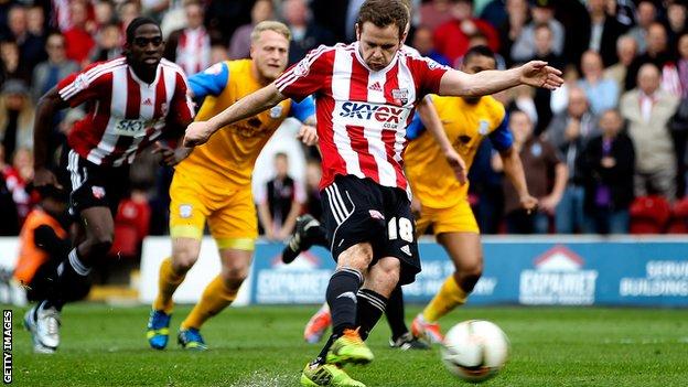 Alan Judge scores for Brentford against Preston North End as the Bees seal promotion to the Championship