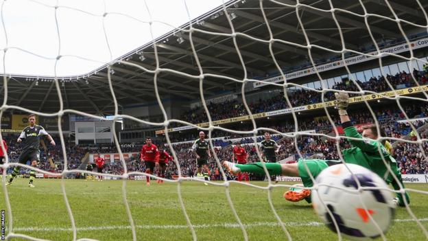 Marko Arnautovic of Stoke City fires the Potters in front from the penalty spot in first-half injury time during the Premier League match against Cardiff City