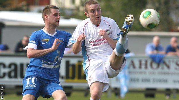 Ballinamallard's Liam McMenamin puts pressure on Alan Teggart