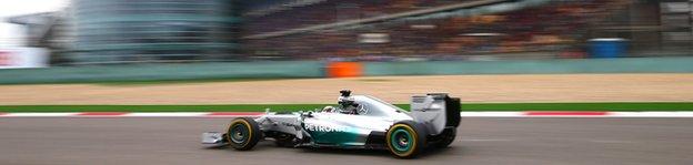 Lewis Hamilton of Great Britain and Mercedes GP leads the Chinese Formula One Grand Prix at the Shanghai International Circuit on April 20, 2014 in Shanghai, China.