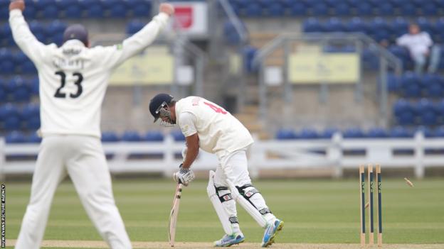 Glamorgan's Jacques Rudolph is bowled out for four on his debut on day one of the LV County Championship Division Two clash against Gloucestershire at the Swalec Stadium