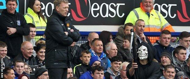 A fan dressed as the Grim Reaper taunted David Moyes in his last game in charge of Manchester United