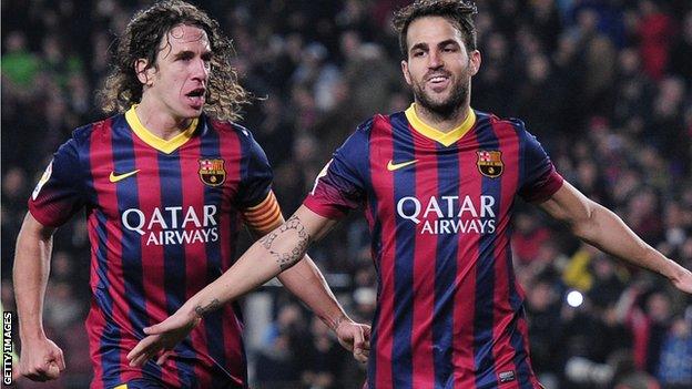 Carles Puyol and Cesc Fabregas