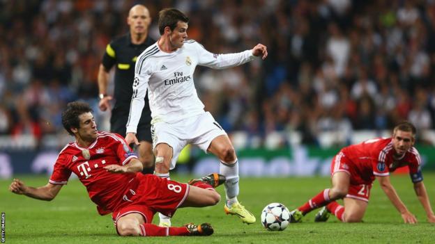 Gareth Bale takes on Bayern Munich’s Javi Martinez and Philipp Lahm after coming off the bench in Real Madrid’s 1-0 win in the Champions League semi-final first leg.