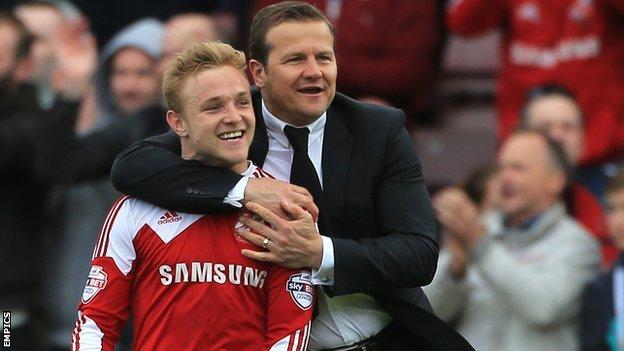 Alex Pritchard and Swindon manager Mark Cooper