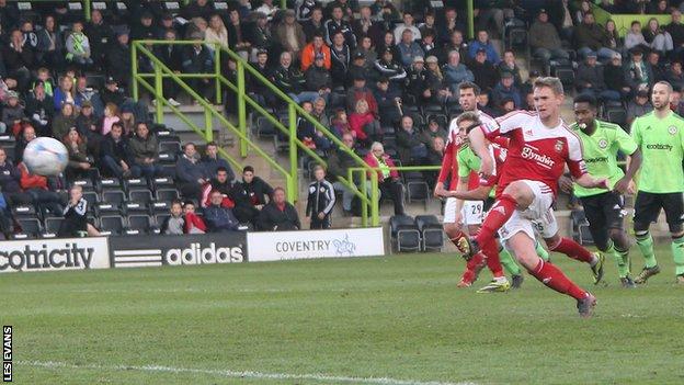 Johnny Hunt scores from the spot for Wrexham against Forest Green Rovers