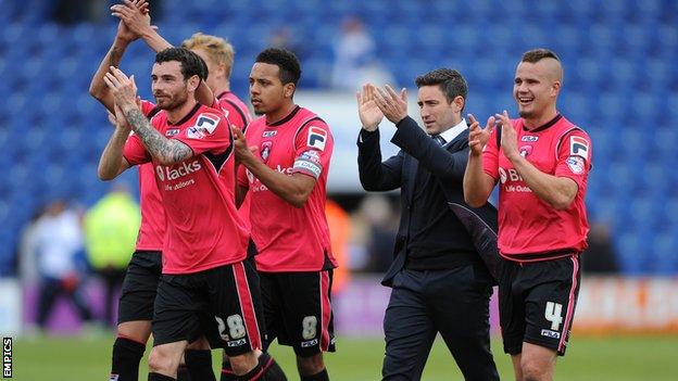 Lee Johnson and his Oldham squad