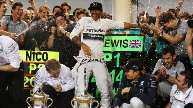 Mercedes' Lewis Hamilton and Nico Rosberg celebrate victory in Bahrain