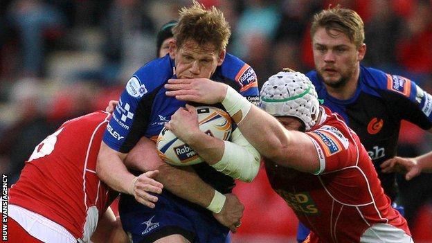 Jake Ball tackles Rhys Thomas