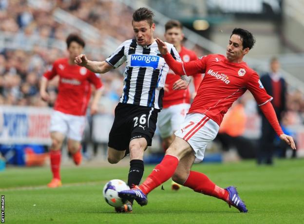 Cardiff's Peter Whittingham tackles Mathieu Debuchy