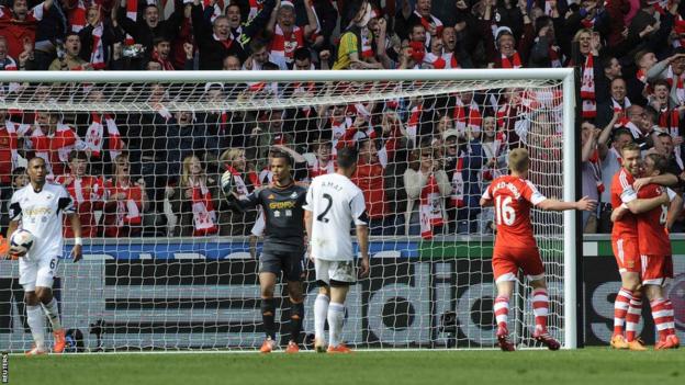 Southampton's Rickie Lambert celebrates scoring at Liberty Stadium