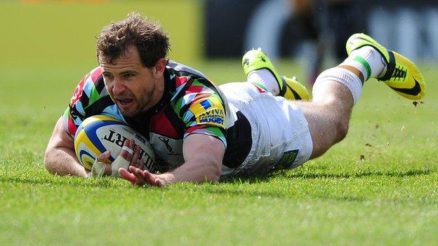 Harlequins stand-off Nick Evans celebrates the second of his side's four tries at Sandy Park