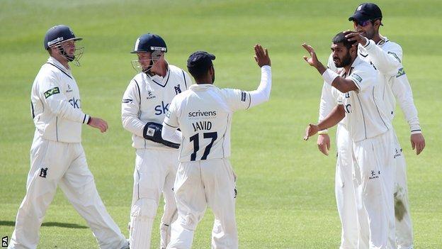 Warwickshire celebrate the wicket of Middlesex captain Chris Rogers at Edgbaston