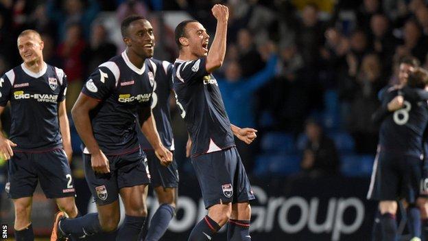 Ross County players celebrate after securing their Scottish Premiership status