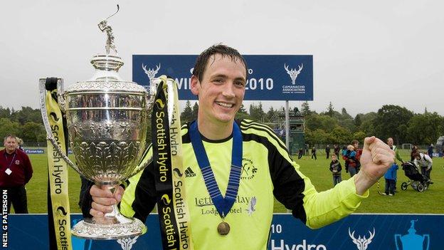 Gary Innes with the Camanachd Cup in 2010