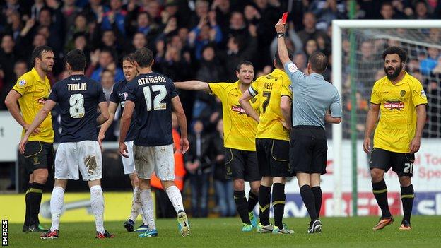 Ian Sharps (far left) is sent off by referee Oliver Langford