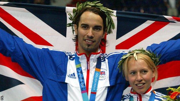 Nathan Robertson celebrates his Olympic silver medal in Athens