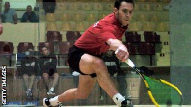 David Evans playing squash
