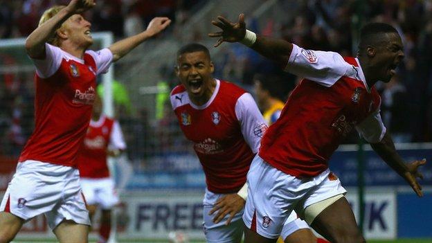 Rotherham players celebrate Kieran Agard's goal