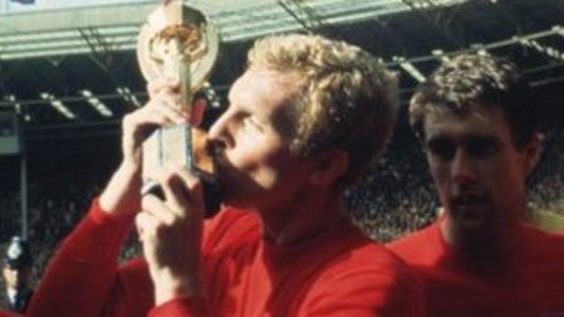 Bobby Moore kisses the Jules Rimet trophy after England beat West Germany to win the 1966 World Cup