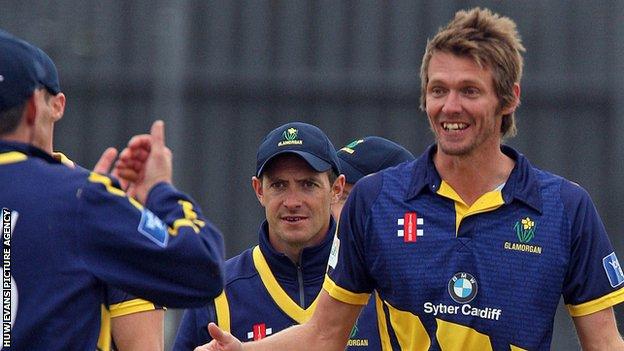 Michael Hogan celebrates taking a wicket for Glamorgan