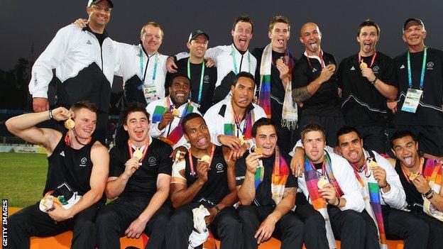 New Zealand celebrate winning gold at the 2010 Commonwealth Games rugby sevens