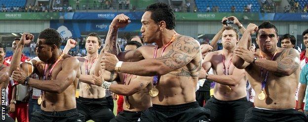 New Zealand's rugby sevens players perform a 'Haka' after winning gold at the 2010 Commonwealth Games
