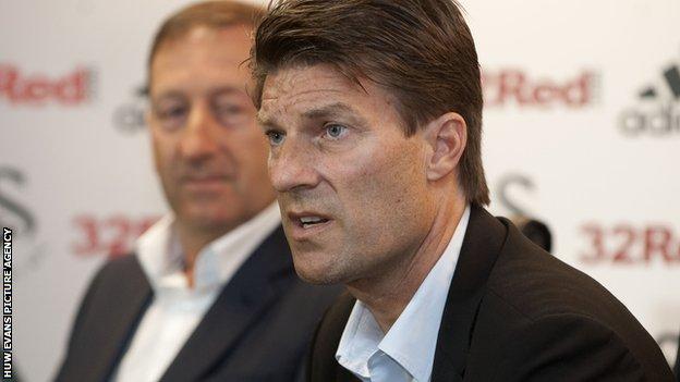 Laudrup with Huw Jenkins in the background
