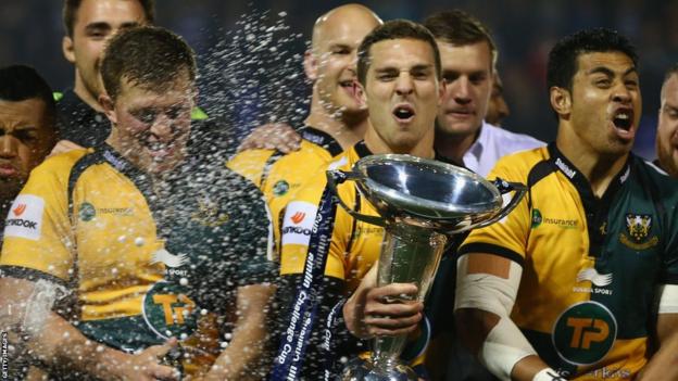 Welsh international George North holds the Amlin Challenge Cup as Northampton Saints beat Bath 30-16 at Cardiff Arms Park.