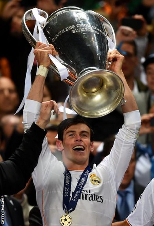 Gareth Bale lifts the Champions League trophy following Real Madrid’s 4-1 extra time win over Atletico Madrid.