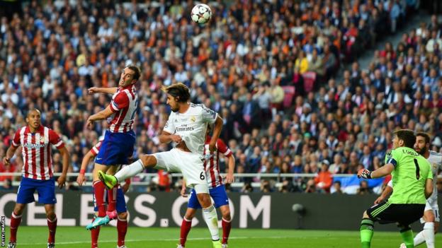 Diego Godin scores for Atletico Madrid to put them one nil up after Iker Casillas makes a bad decision to come for the ball