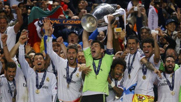 Iker Casillas lifts the Champions League trophy as Real Madrid win the competition for the 10th time