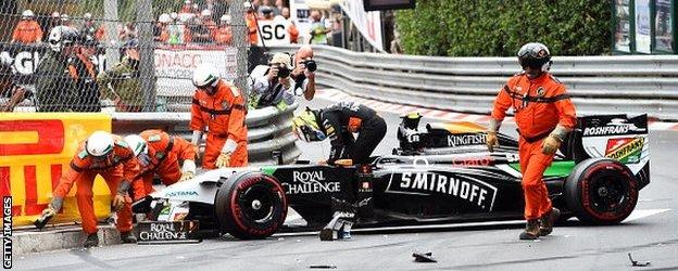 Sergio Perez gets out of his car