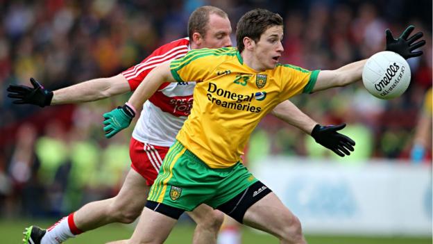 Derry's Sean Leo McGoldrick in action against Darach O'Connor of Donegal